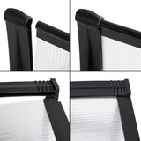 Instahut Window Door Awning Canopy 1mx2m Transparent Sheet Black Plastic Frame - 45-Degree Angle