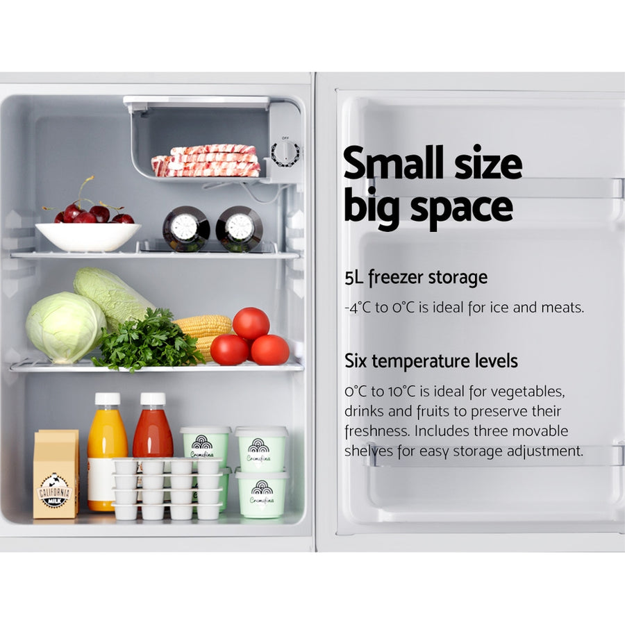 Devanti 70L portable white mini bar fridge with door compartment, height adjustable feet