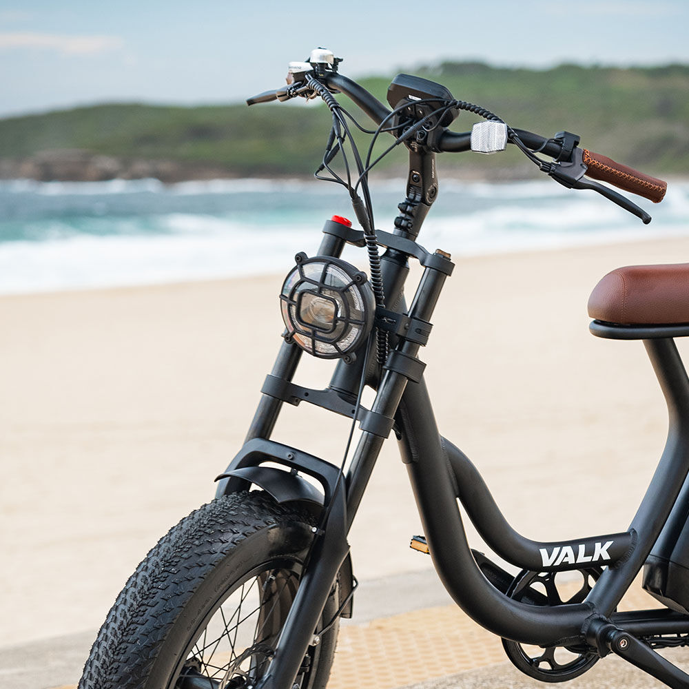 VALK Nomad Electric Fat Tyre Bike, 350W, 32km/hr, Throttle ebike, Disc Brakes, Step-Through Alloy, Shimano 7 spd, 20x4' Kenda Tyres, Suspension, Black
