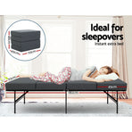 Giselle Bedding foldable foam single mattress in dark grey, folded as a couch