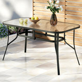 Gardeon 140CM Outdoor Dining Table Steel Frame Tempered Glass Parasol Hole Black - Close-Up Angle