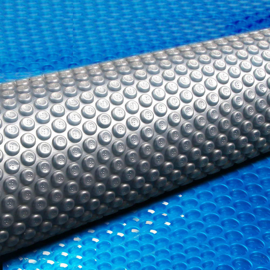 Aquabuddy 500 micron solar pool cover 11x4.8m with blue top and silver underside, image 7