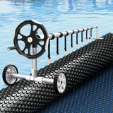 Aqua Buddy Pool Cover 500 Micron 6.5x3m w/ Roller 5.55m Swimming Pools Black Solar Blanket - Close-Up Angle