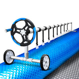 Aquabuddy Pool Cover 500 Micron 8.5x4.2m Silver Swimming Pool Solar Blanket 5.5m Blue Roller - Close-Up Angle