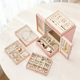 White   1 Large Faux Leather Jewelry Storage Box with 5 Drawers and Gold Handles - An elegant rectangular storage space for rings, necklaces, bracelets, earrings, and watches - Features soft fabric lining, side door design, textured surface finish - Luxur - Low Angle