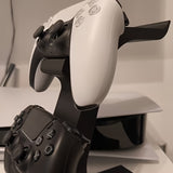WHITE 3-in-1 PS5 and Xbox Controller Stand – Compatible with PlayStation 5/Xbox Consoles. A gaming desktop organizer with a headphone hanger, non-charging base that holds 2 controllers and headphones. Space-saving white/black console accessory. - Side View