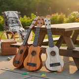 Acacia wood 17-inch Playable Ukulele Mini Guitar, lightweight and portable. Features comfortable nylon strings, includes a pick, and has open-style
