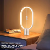Silver Magnetic Balance LED Table Lamp: USB-Powered, Dimmable Eye-Care Light with Award-Winning Design for Australian Homes & Offices - Rear View