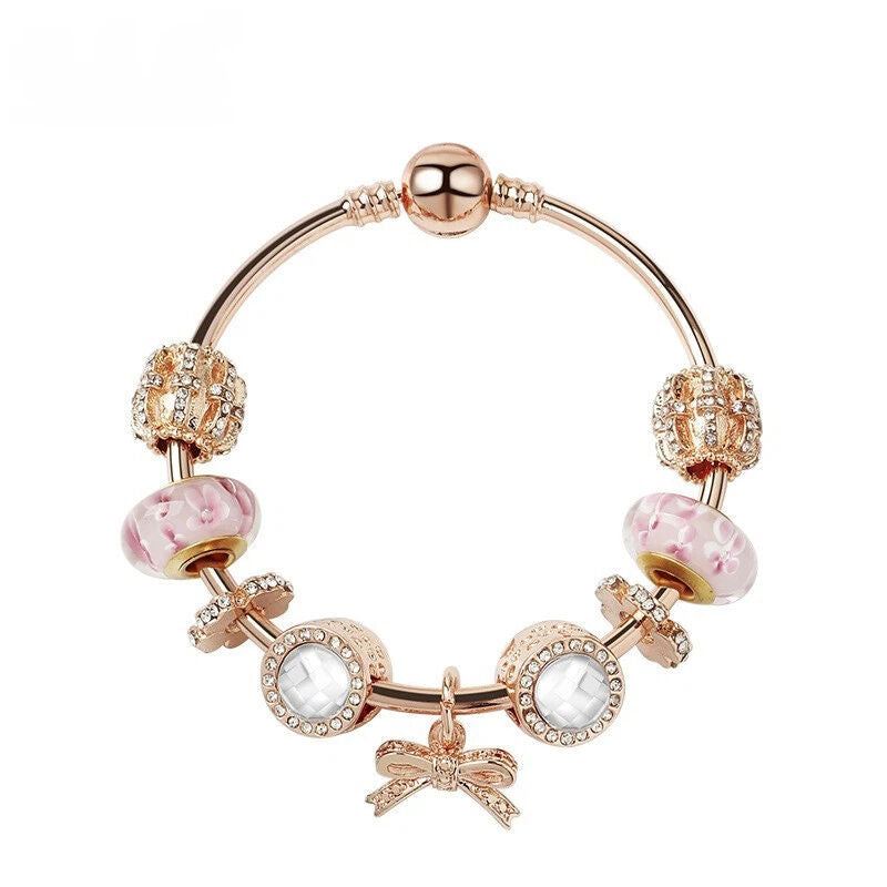 Glamorous Golden Bracelet with Rhinestone Glass, Zircon, Hollow Beads & Bow Pendant(17cm)