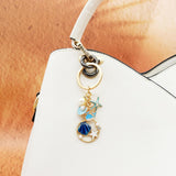 Ocean Keychain Adorable Sea Animal Charms Perfect for Beach Lovers, Travel Enthusiast Ideal for Backpacks - Top-Down View