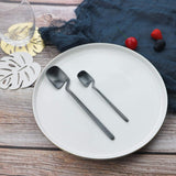 JASHII Flatware Set 32-piece Silverware Set Matte Finished Cutlery Set Service for 8 Include Knife/Fork/Spoon/Coffee spoon Dishwasher Safe (Black) - Top-Down View