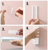 Self-adhesive - Desk socket holder - No perforation - Self-adhesive socket holder - Cable management - No perforation surge protection - Power strip holder bracket (4 pieces) - Top-Down View