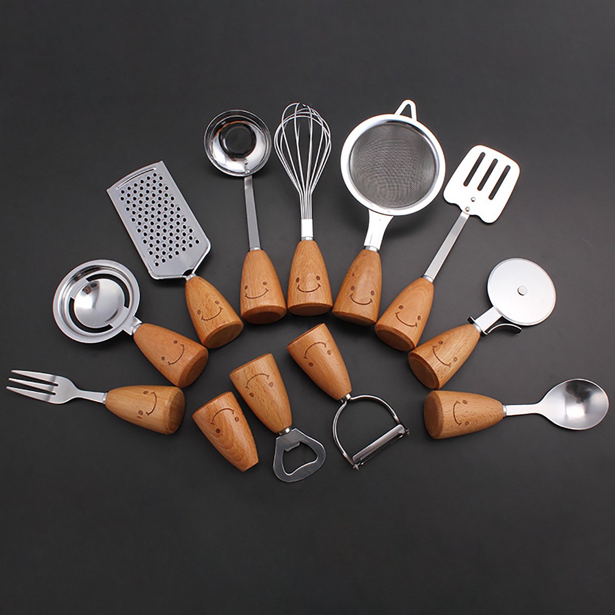 Kitchen Utensil Set - 12 Piece - Includes a peeler, egg separator, spoon, fork, pizza cutter, bottle opener, spatula, slotted spoon, grater, soup ladle, whisk and toothpick holder - The perfect gift for a housewife.