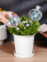 Large Plant Watering Balls (2-Pack), Iridescent Glass Cactus Self-Watering Globe, Glass Watering Device for Potted Plants - 4.7 oz/140 ml Capacity, Automatic Irrigation System, Cute Garden Gift - Front View