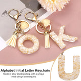 Letter U Keychain with Tassel and Lobster Clasp for Bag Purse Keys, Cream Gold, Daily Comfort Use, for Men Women and Everyday Wear - Top-Down View