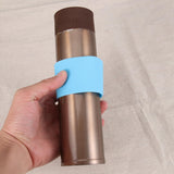 Worgeous 4pcs Silicone Heat resistant Cup Sleeves Non slip Protective Water Glass Covers for Bottles and Mugs (Green Light Blue Pink Yellow) - Low Angle