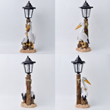 Pelican Garden Statue with Solar Lantern Pelican Solar Light for Outside Decor Sculptures & Statues Lights for Lawn Decor A - Top-Down View