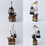 Pelican Garden Statue with Solar Lantern Pelican Solar Light for Outside Decor Sculptures & Statues Lights for Lawn Decor C - Top-Down View