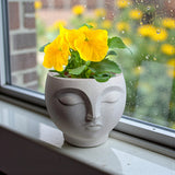 A 3D-printed, serene flowerpot, an eye-catching decorative piece for modern interior spaces. Suitable for planting small plants or succulents. - Side View