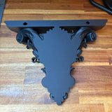 3D-printed Gothic wall shelf brackets add a touch of classic Gothic elegance to your interior. Black - Front View