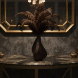 3D-printed sculpture of a contemplative vase,black