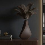 3D-printed sculpture of a contemplative vase,black