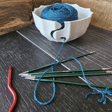 A 3D-printed yarn bowl to accompany your knitting and crochet time. White.