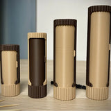 Compact 3D-printed rotating organizer capsule, 1.3 inches long x 4.1 inches high. - Front View
