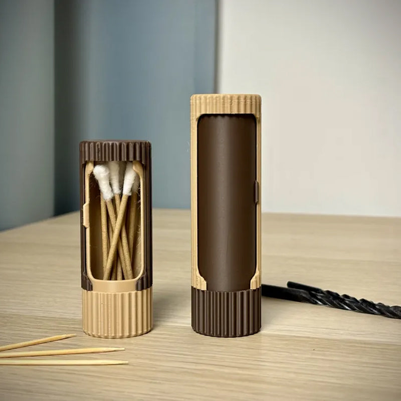 Compact 3D-printed rotating organizer capsule, 1.3 inches long x 4.1 inches high.
