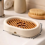3D-printed oval soap dish with drain rack, white and wood-look. - Top-Down View
