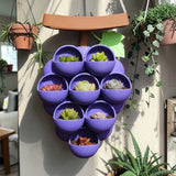 3D-printed grape pots in purple, brown, and green. - Front View