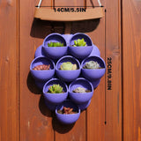 3D-printed grape pots in purple, brown, and green. - Side View