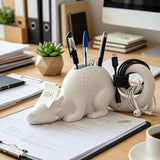 A 3D-printed dragon-shaped desktop organizer adds a touch of fantasy and order to your workspace. (White) - Front View
