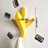 3D-printed banana wall hooks, home decor, yellow. - Front View