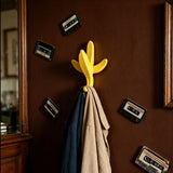 3D-printed banana wall hooks, home decor, yellow. - Side View