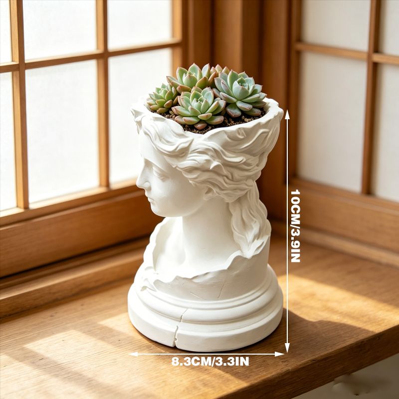 A 3D-printed, broken goddess-themed flowerpot, combining decorative and functional elements, in white.