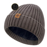 Unisex brown warm knitted winter hat, fleece lining, soft and warm, ski hat, narrow brim, suitable for cold weather.