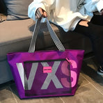 Large canvas tote bag with transparent letter patch, polyester lining, extra-large capacity fits A4 files, multiple pockets, perfect for commute, school, shopping, and short trips.*dark blue
