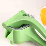 Manual Juicer - Fruit and Vegetable Juicers - Portable Multifunctional Lemon and Orange Juicer for Home Use - High Efficiency Juicing Appliance - Light Green - 45-Degree Angle