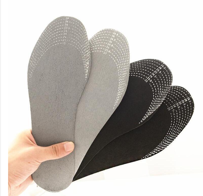 pairs of moisture-absorbing and odor-neutralizing shoe insoles with activated carbon for natural elimination of bad odors