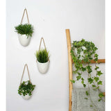 Set of 3 white ceramic wall pots - Fei Yu - Top-Down View