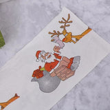 rolls of Christmas themed toilet paper for home, office or restroom - 45-Degree Angle