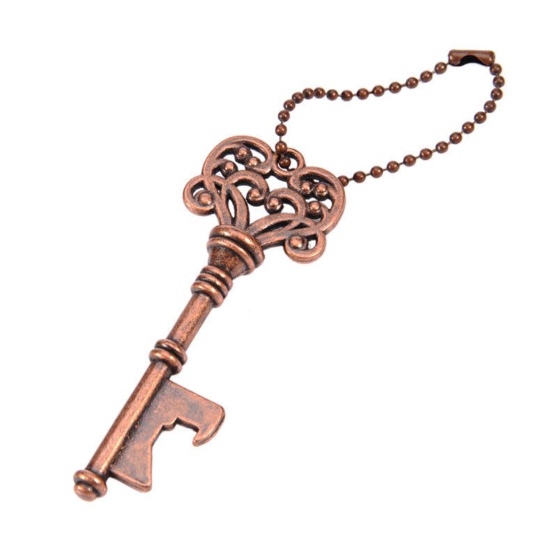 Vintage silver key bottle opener and cap opener