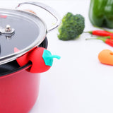 3 Piece Silicone Pot Lid Risers Carrot Chili and Drumstick - Top-Down View