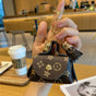 Mini Printed Leather Coin Purse with Tassel Keychain and Earphone Storage Pouch—Brown