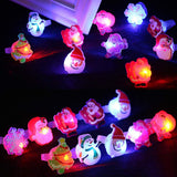50Pcs Christmas LED Finger Lights Cute Cartoon LED Rings Party Favors for Kids Adults Light Up Toys Rings Stocking Stuffers - Top-Down View