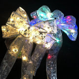 Glowing Christmas Transparent Bow Hanging Pendant Light Up Bow Hanging Ornaments String Lamp for Christmas Tree and Garden - Close-Up Angle