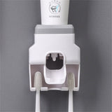 Automatic Toothpaste Dispenser Squeezer with Toothbrush Holder Wall Mounted for Bathroom Adults KidsGrey - Front View