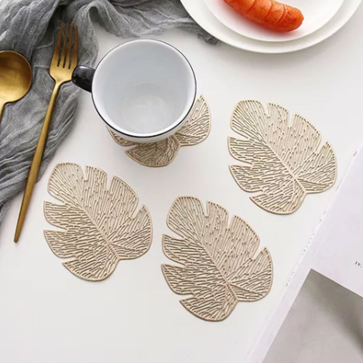 Placemats and Coasters Set Hollow Insulation 6 Pcs Round Dining Table Place Mats and 6 Pcs Leaf Shape Cup Coasters Gold