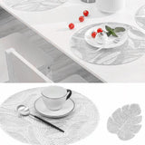 Placemats and Coasters Set Hollow Insulation 6 Pcs Round Dining Table Place Mats and 6 Pcs Leaf Shape Cup Coasters Silver - Close-Up Angle